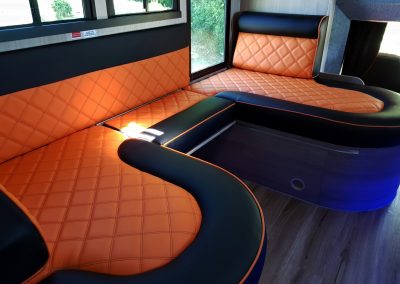 Helios 7.5 tonne horsebox living with orange upholstery