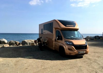 Gold Aeos Horsebox at the seaside